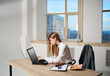 © SHOTPRIME STUDIO - Woman secretary working desk laptop office professional communication