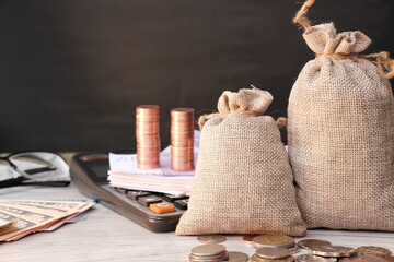 Wall Mural - stack of coin on table background and saving money and business growth concept