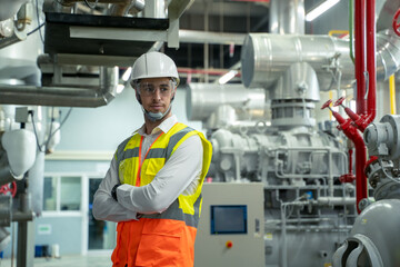 Aufkleber - Technician engineer checking controls system for security functions in service room at factory,Heating,Ventilation,Air Conditioning.