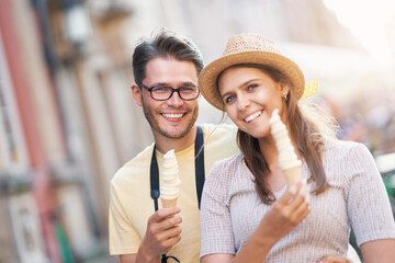 Wall Mural - Happy tourists sightseeing during summer holidays