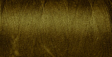 Gold Cotton Threads With Visible Details. Background