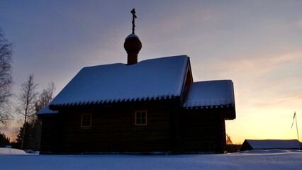 Wall Mural - New wooden church on a cloudy winter day
