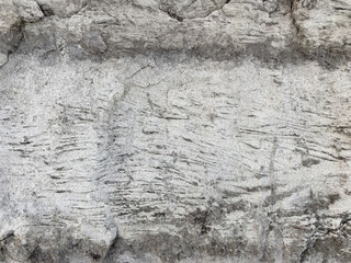 Wall Mural - Top view of black, white, gray grunge textured rough stone background with cracks, scratches and stains. Creative concrete backdrop. 