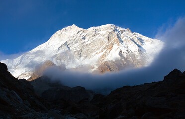 Wall Mural - Mount Makalu with clouds, Nepal Himalayas mountains