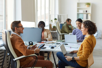 Male Business Manager Talking to Employee