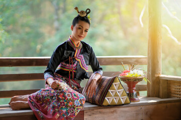 Wall Mural - Beautiful Thai woman wearing Thai traditional clothing.	