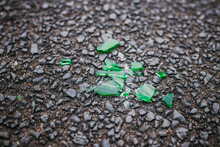 Shattered Green Glass On Asphalt, Broken Bottle