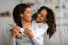 Cheerful African American Mother And Daughter Having Fun At Home