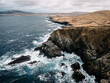 © ALEKSANDR MAZUROV/Stocksy - Moody day on the rocky shore of Shetland