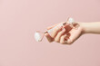 © Maki Company Limited/Stocksy - Rose quartz roller in woman's hand