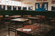 © Luis Herrera/Stocksy - messy public school classroom