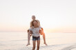 © Hernandez & Sorokina/Stocksy - Cheerful Friends In The Beach