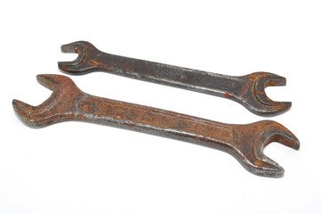 Rusty wrench on white background close-up. Tool, old, rare