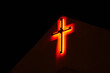 © Mykhailo Onyshkiv/Stocksy - lonely red neon cross