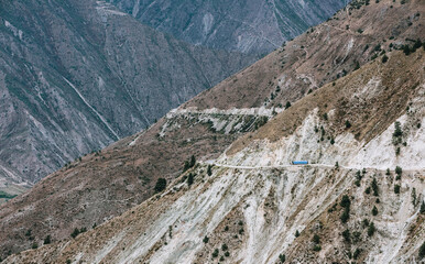 Wall Mural - A section of tarmac road halfway up the mountain