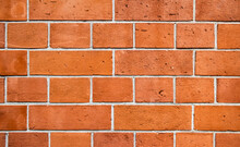 Orange Brick Wall. Back To School Concept. Copy Space Wall.