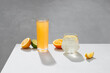 © Maki Company Limited/Stocksy - glass of fresh orange juice with fresh fruits
