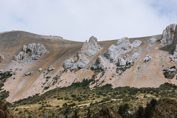 Wall Mural - Aerial photography of basaltic mountains and clouds along the Yunnan-Tibet route