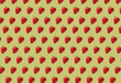 © Yaroslav Danylchenko/Stocksy - Horizontal pattern from ripe fresh strawberry.