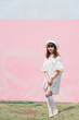 © Pansfun Images/Stocksy - Asian fashion young female with hat portrait