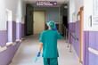 © Nunez Image/Stocksy - Backview of Medical Worker