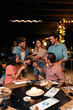 © Nunez Image/Stocksy - Friends Enjoying Dinner at Restaurant