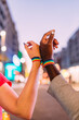 © MyMicrostock/Stocksy - Crop unrecognizable multiracial couple wearing pride bracelets