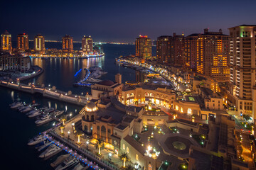 Wall Mural - Beautiful Aerial View of Pearl Qatar. Roundabout Pearl Qatar at sunset time. 