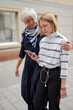 © Tatiana Timofeeva/Stocksy - Active age ageless senior woman with daughter