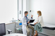 © ALTO IMAGES/Stocksy - A doctor with his patient