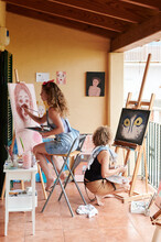 Woman And Mom Painting In Their Art Space