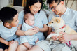 © MaaHoo Studio/Stocksy - Asian family at home