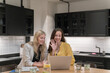 © Hernandez & Sorokina/Stocksy - Women Having Video Conference Indoors
