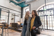 © Hernandez & Sorokina/Stocksy - Female Friends Talking In The Hotel Entrance