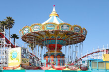 Colorful Carousel At Amusement Park