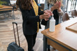 © Hernandez & Sorokina/Stocksy - Women Disinfecting Hands Indoors