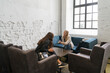 © Hernandez & Sorokina/Stocksy - Two Ladies Talking In Cafe