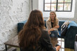 © Hernandez & Sorokina/Stocksy - Women Meeting In Modern Cafeteria