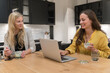 © Hernandez & Sorokina/Stocksy - Colleagues Having Lunch In Office Kitchen