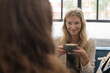 © Hernandez & Sorokina/Stocksy - Women Meeting In Cafe