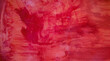 red and maroon color paint brush strokes on a surface - artistic abstract background for a wallpaper