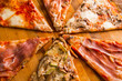 © Vulp - Close up photo of different types of italian pizza
