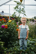 © Melissa Milis Photography/Stocksy - little boy in conservatory