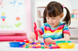 © M-image - young girl play math and color sorting fine motor skill game for  homeschooling