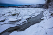 © Robert Downie/Stocksy - Frozen Creek on the Nechako River Ice Jam