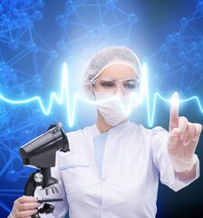 Wall Mural - Woman doctor in telemedicine futuristic concept