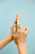 © Yelizaveta Vlasenko/Stocksy - Glitter hands
