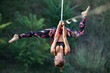 © Jovana Milanko/Stocksy - Woman dancing on slackline highline
