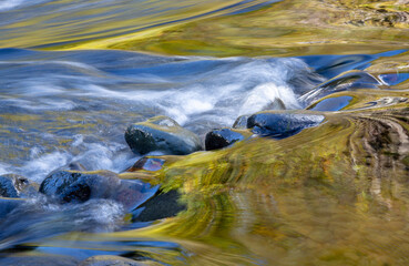 Sticker - USA, Oregon. Abstract of autumn colors reflected in Wilson River rapids.