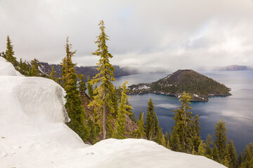 Sticker - USA, Oregon, Crater Lake National Park. Wizard Island in lake in winter.